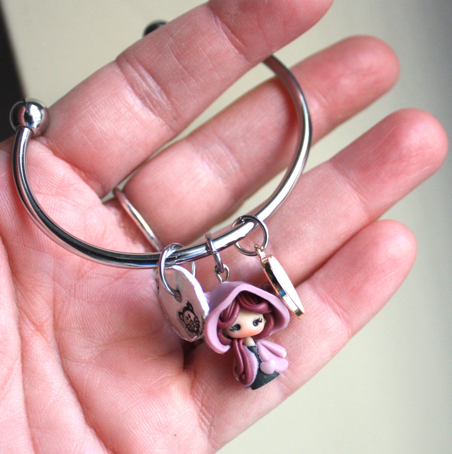 Stainless steel bangle bracelet with cat doll and engraved charm