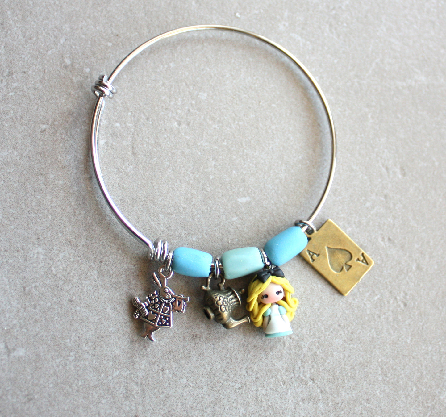 Bracciale Alice in Wonderland – Bangle in acciaio inox