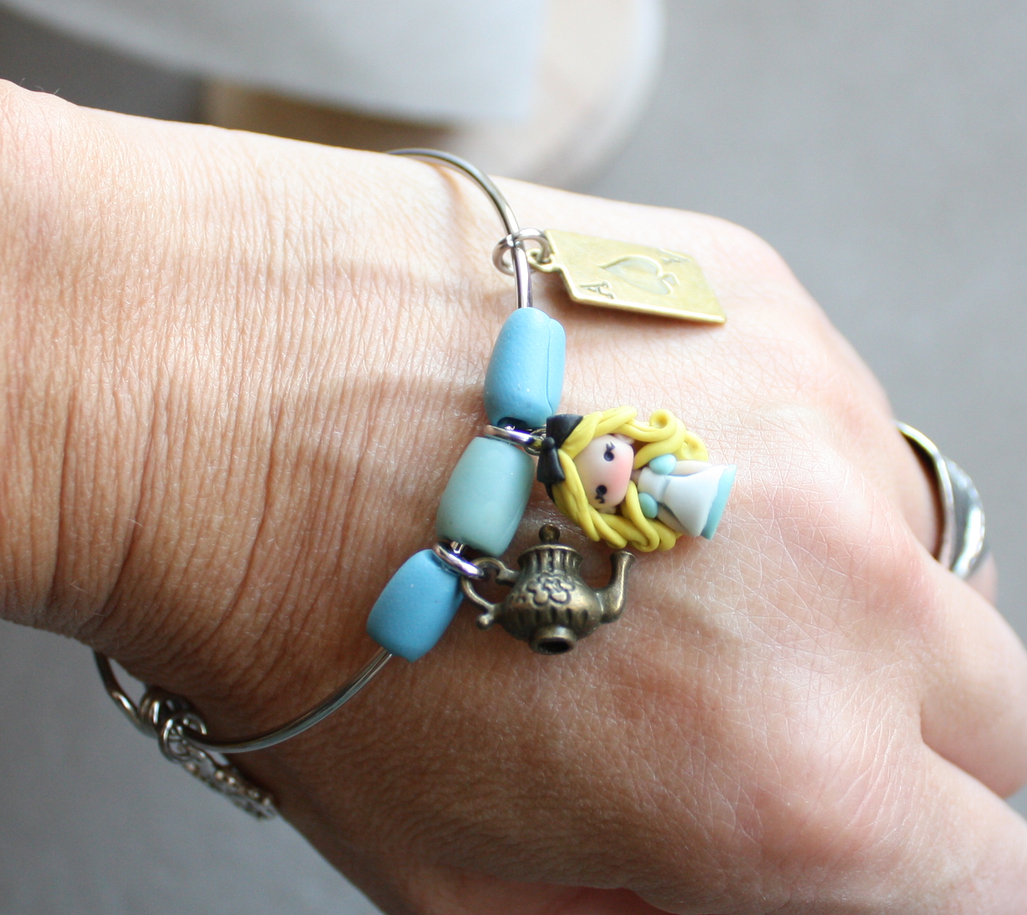 Bracciale Alice in Wonderland – Bangle in acciaio inox