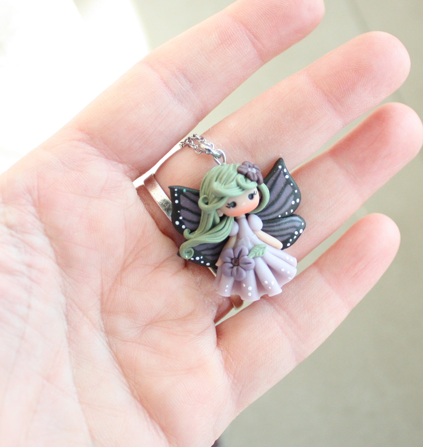 Collana in acciaio inox con fatina farfalla II