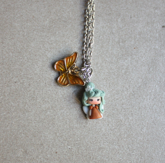 Stainless Steel Necklace with Polymer Clay Fairy and Enamel Butterfly