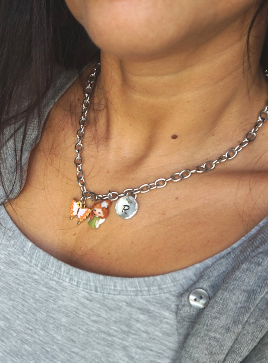 Collana girocollo in acciaio inox con lettera e fatina