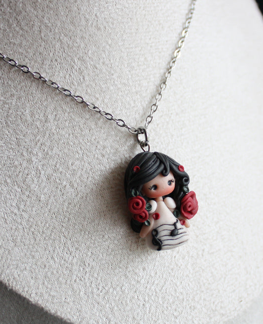 Collana in acciaio inox con bambolina musica II