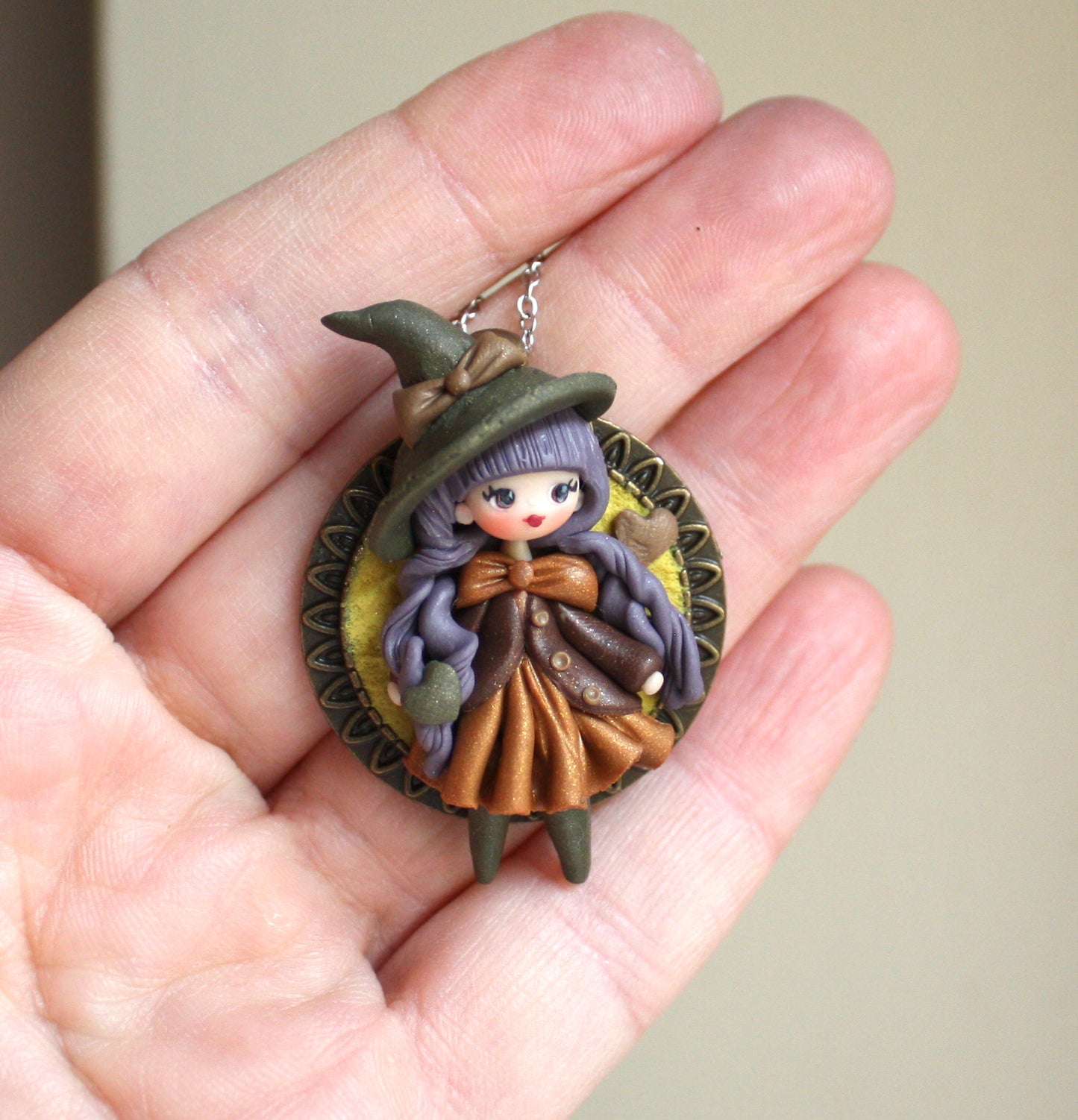 Collana in acciaio inox con piccola streghetta in fimo IX