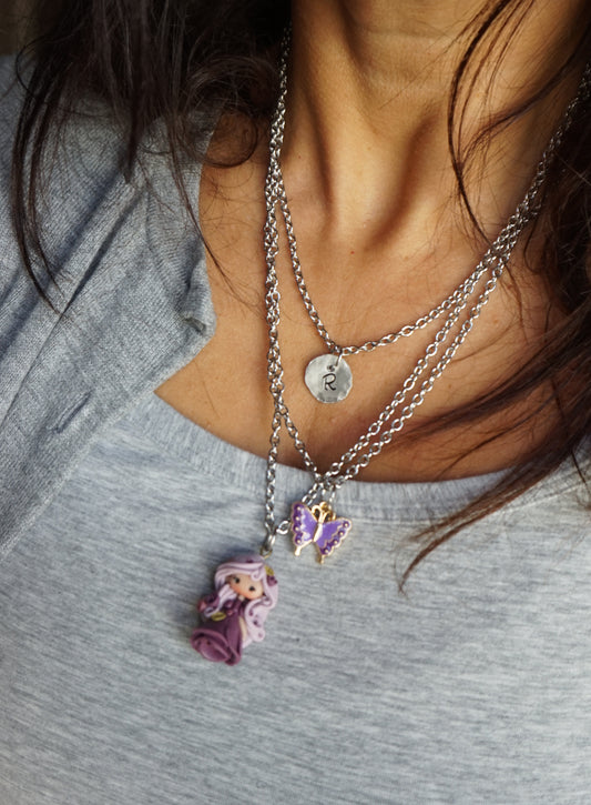 Three-strand stainless steel necklace with nymph