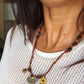Short necklace, also wearable as a bracelet.