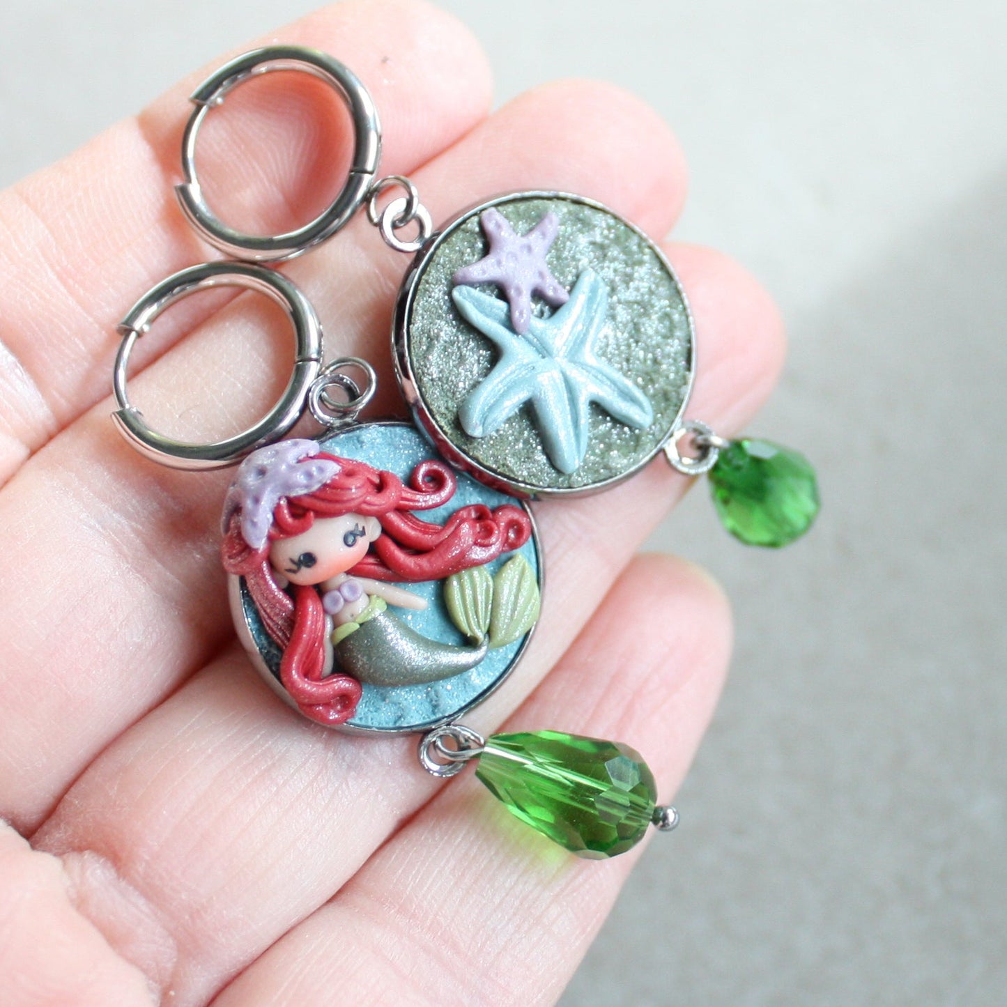 orecchini in acciaio inox con piccola Ariel