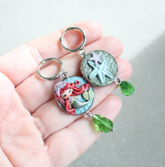 orecchini in acciaio inox con piccola Ariel