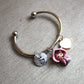 Stainless steel bangle bracelet with cat doll and engraved charm