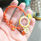 Sicilian Macramé Bracelet with Orange Waxed Cotton and Enamel Citrus Charms