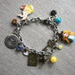 Bracciale multicharms in acciaio inox con Alice in fimo