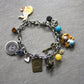 Bracciale multicharms in acciaio inox con Alice in fimo
