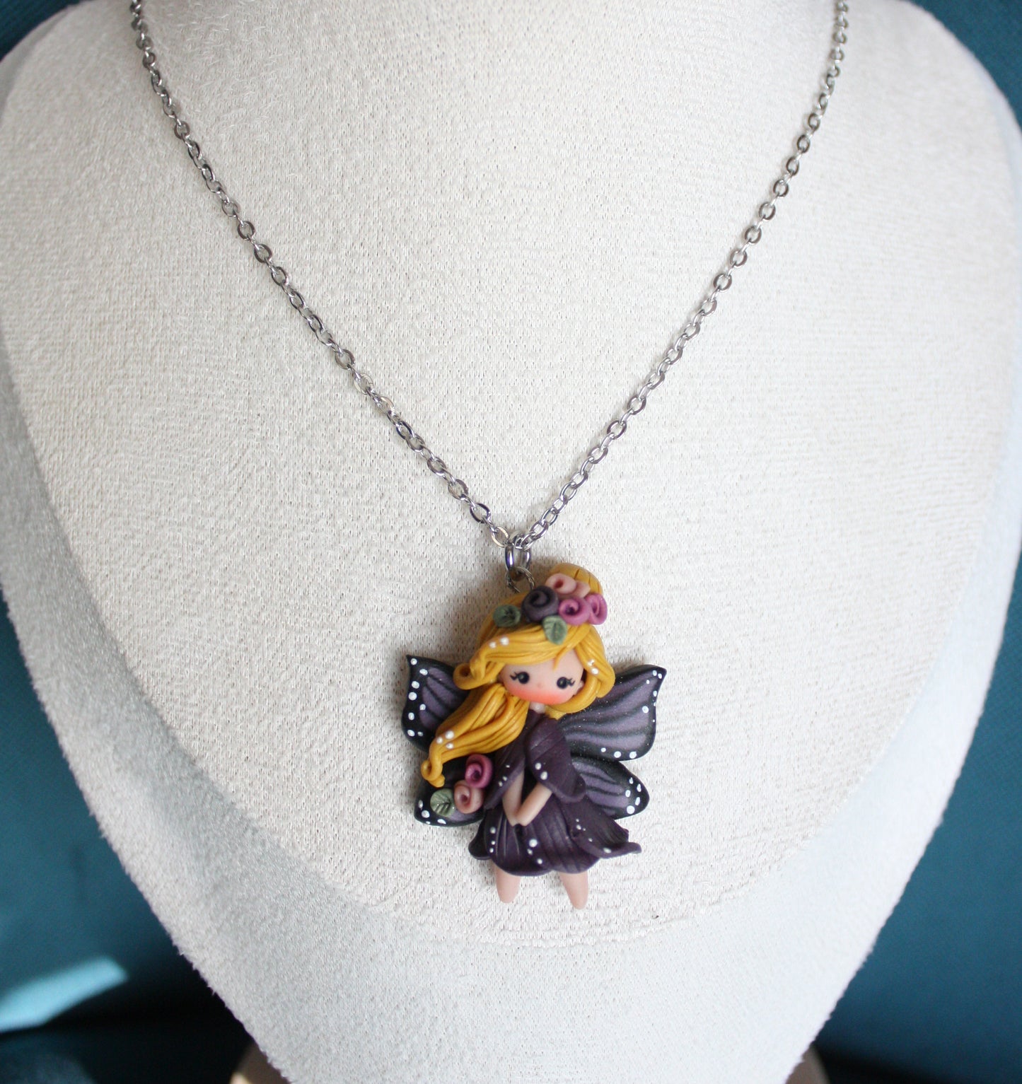 Collana in acciaio inox con fatina farfalla IV