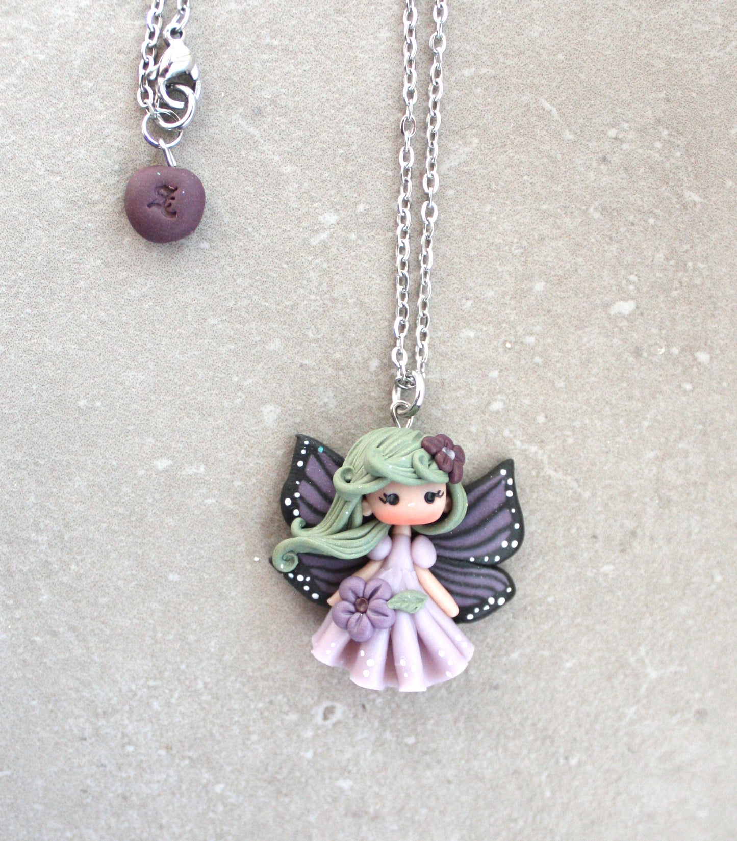 Collana in acciaio inox con fatina farfalla II