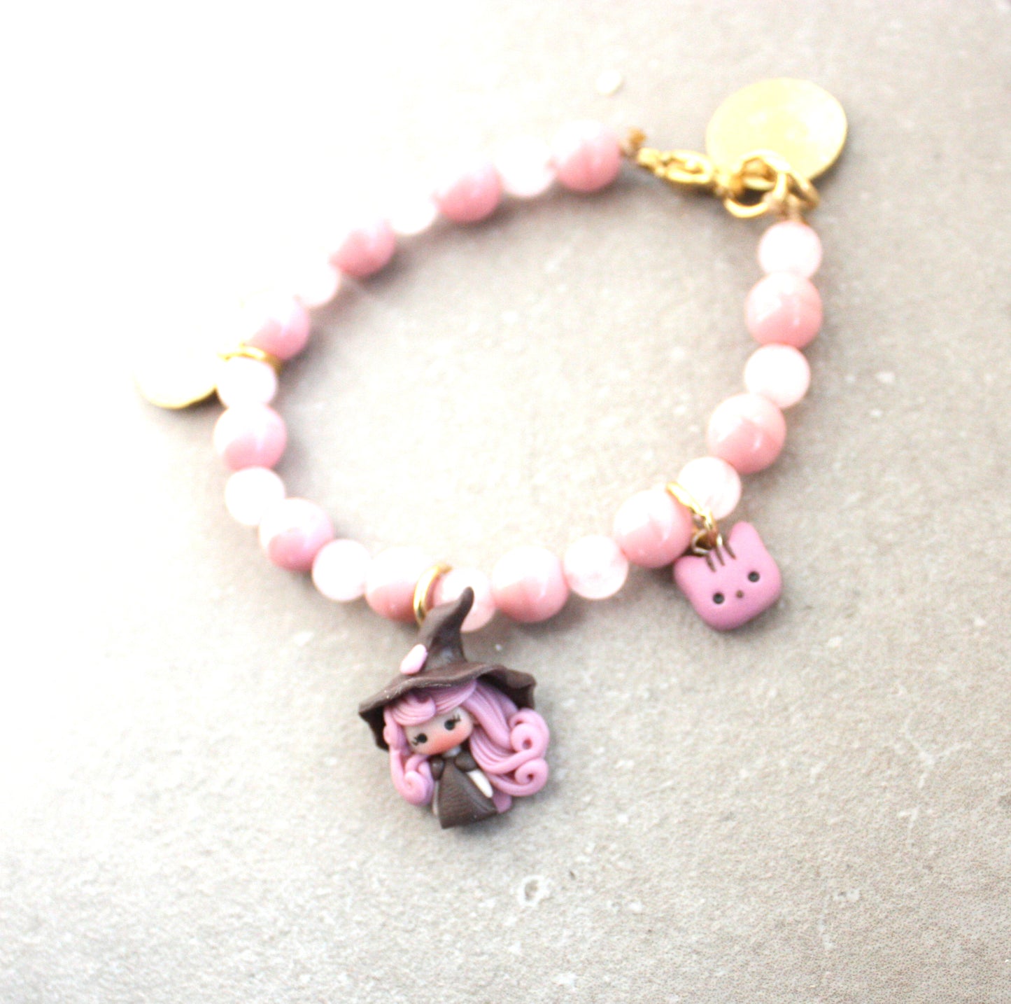 Bracciale pietre rosa e streghetta
