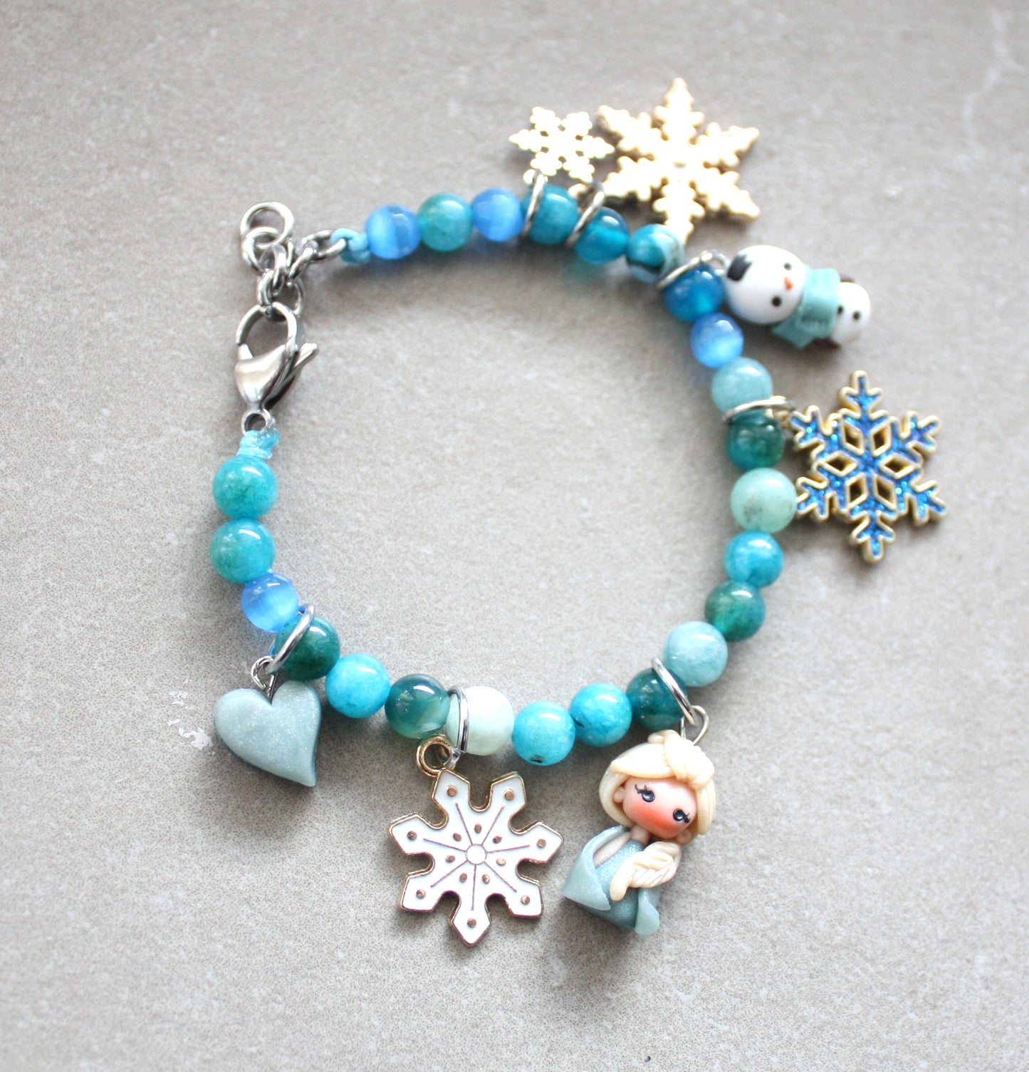 Bracciale Frozen con pietre dure azzurre-  Elsa e Olaf in fimo