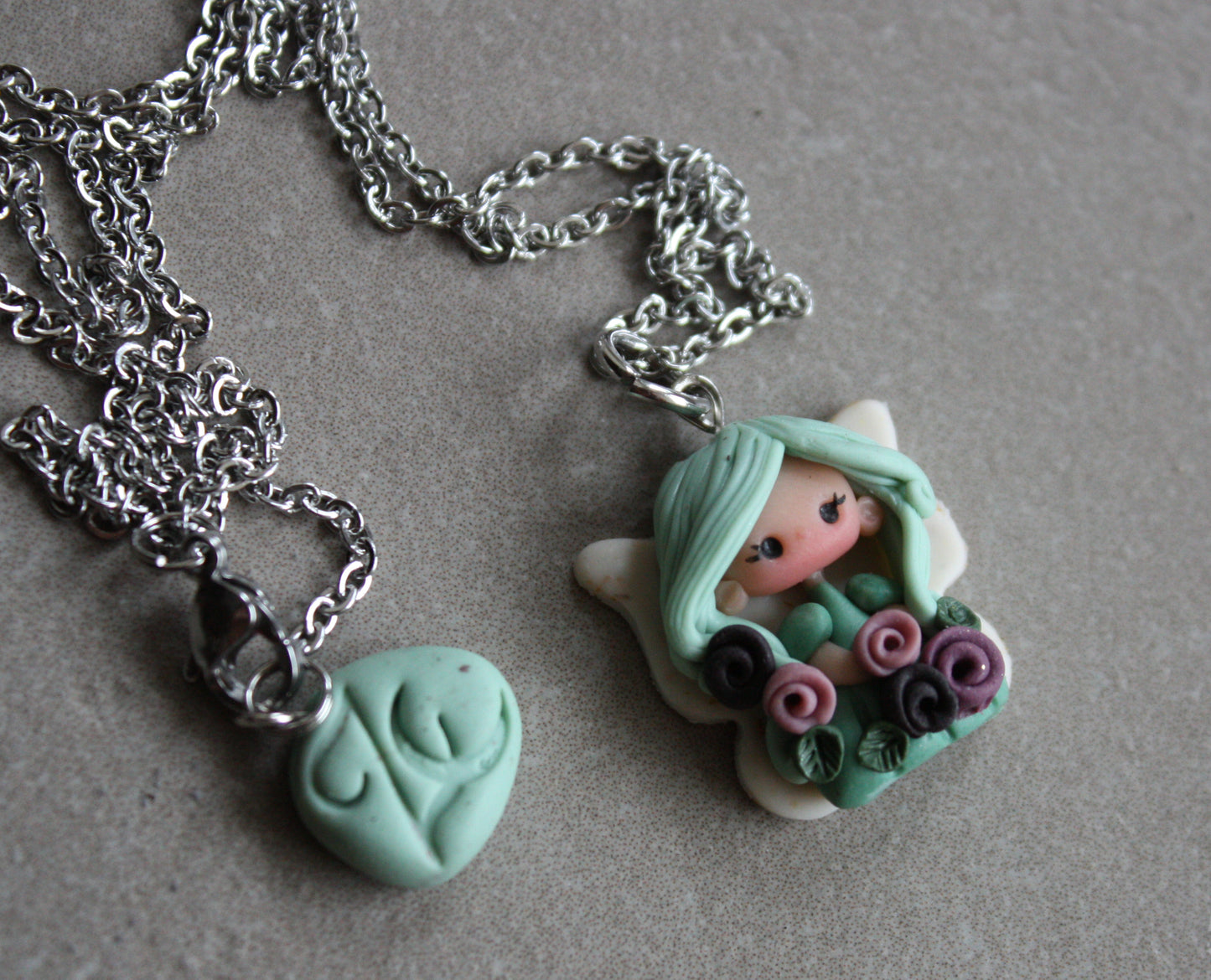 Necklace with a small fairy.