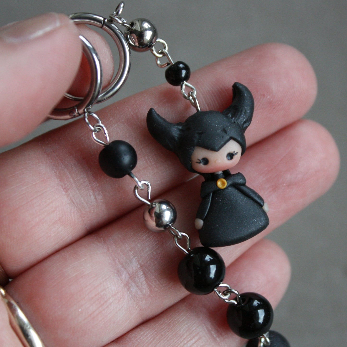 Dangling Maleficent earrings