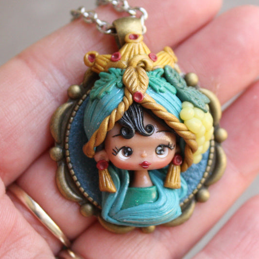 Handmade Moor's Head Pendant in Polymer Clay

