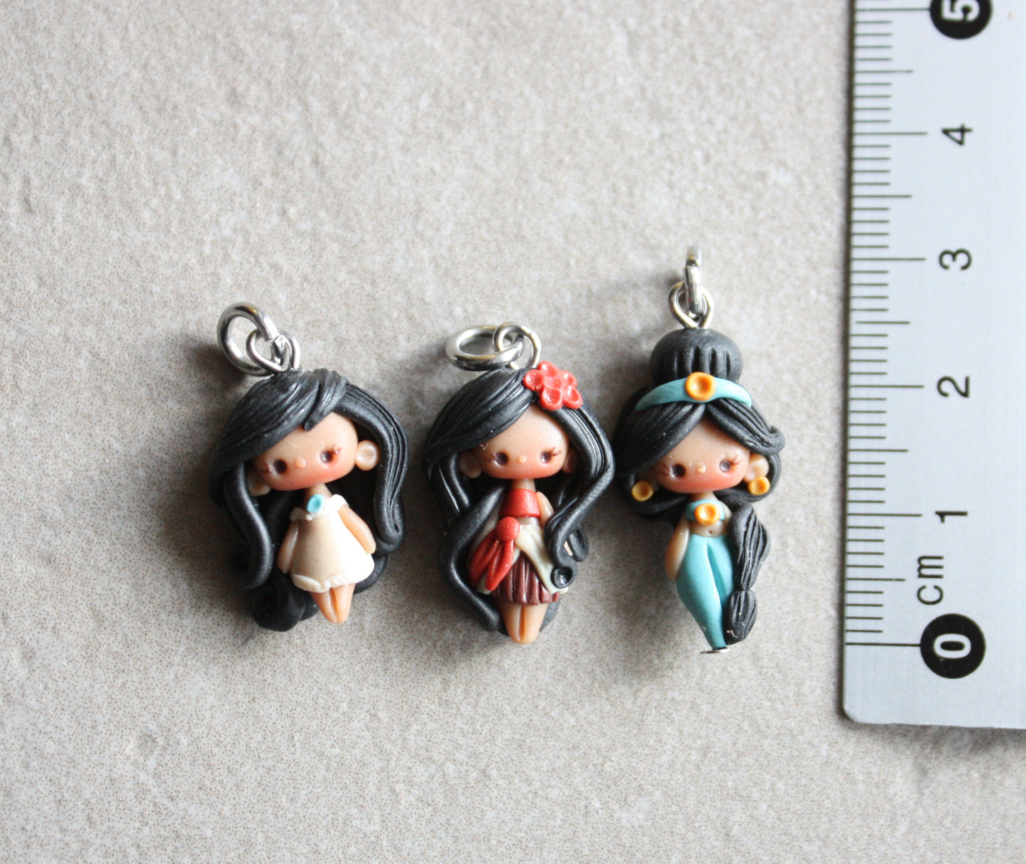 In stock! Jasmine, Moana, and Pocahontas charms