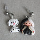 Cruella dangling earrings