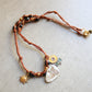 Short necklace, also wearable as a bracelet.