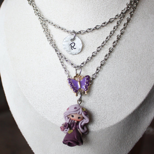 Three-strand stainless steel necklace with nymph