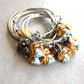 Bracciale bangle in acciaio inox con Alice in fimo