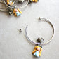 Bracciale bangle in acciaio inox con Alice in fimo