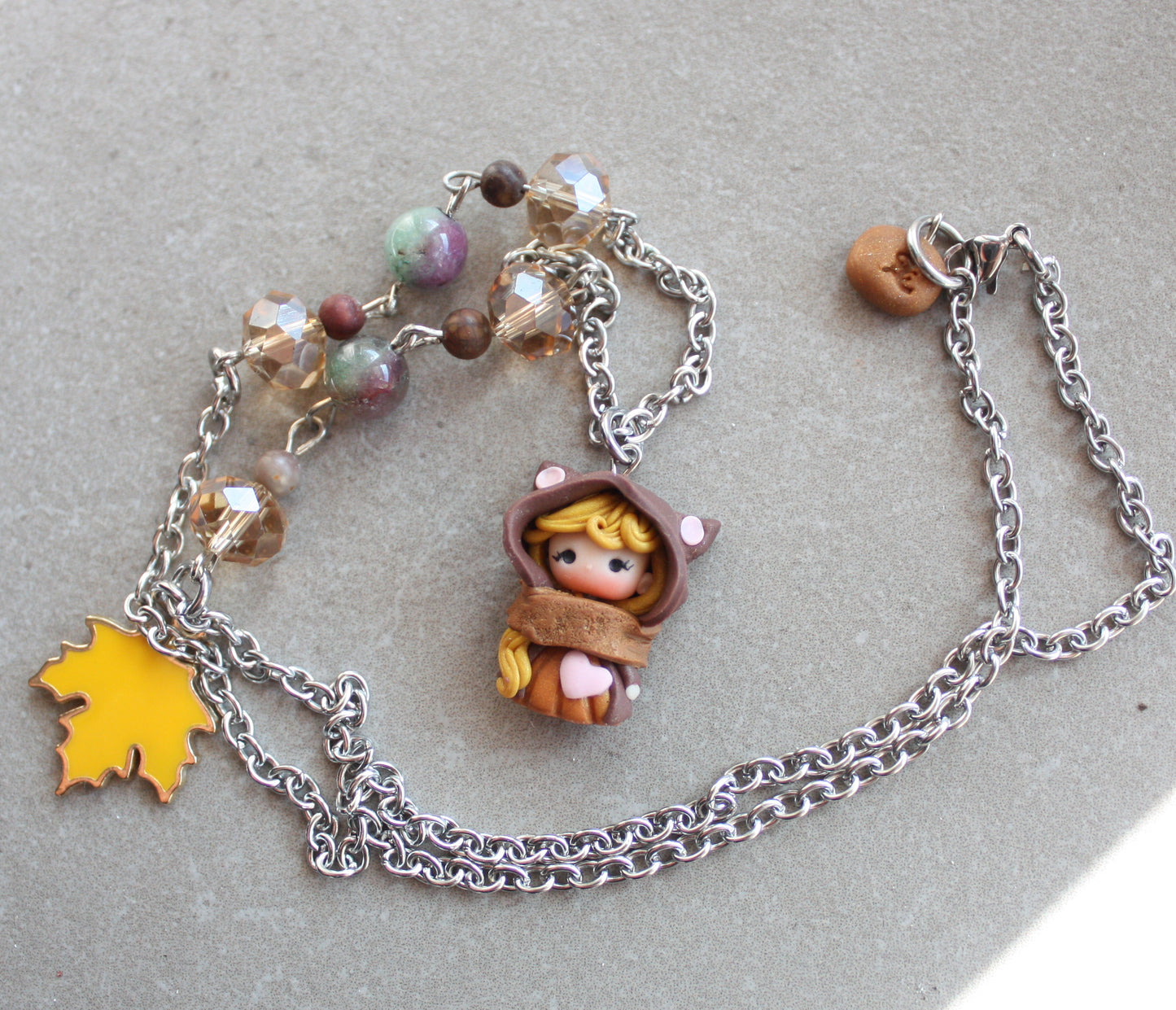 Collana in acciaio inox con cat doll, cristalli e pietre dure