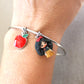 Bracciale bangle in acciaio inox con Biancaneve in fimo e ciondolo mela smaltata