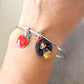 Bracciale bangle in acciaio inox con Biancaneve in fimo e ciondolo mela smaltata