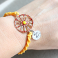 Sicilian Bracelet with Yellow Waxed Cotton & Enamel Cart Wheel Charm