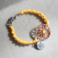 Sicilian Bracelet with Yellow Waxed Cotton & Enamel Cart Wheel Charm