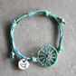 Sicilian Macramé Bracelet with Blue & Green Waxed Cotton and Enamel Cart Wheel