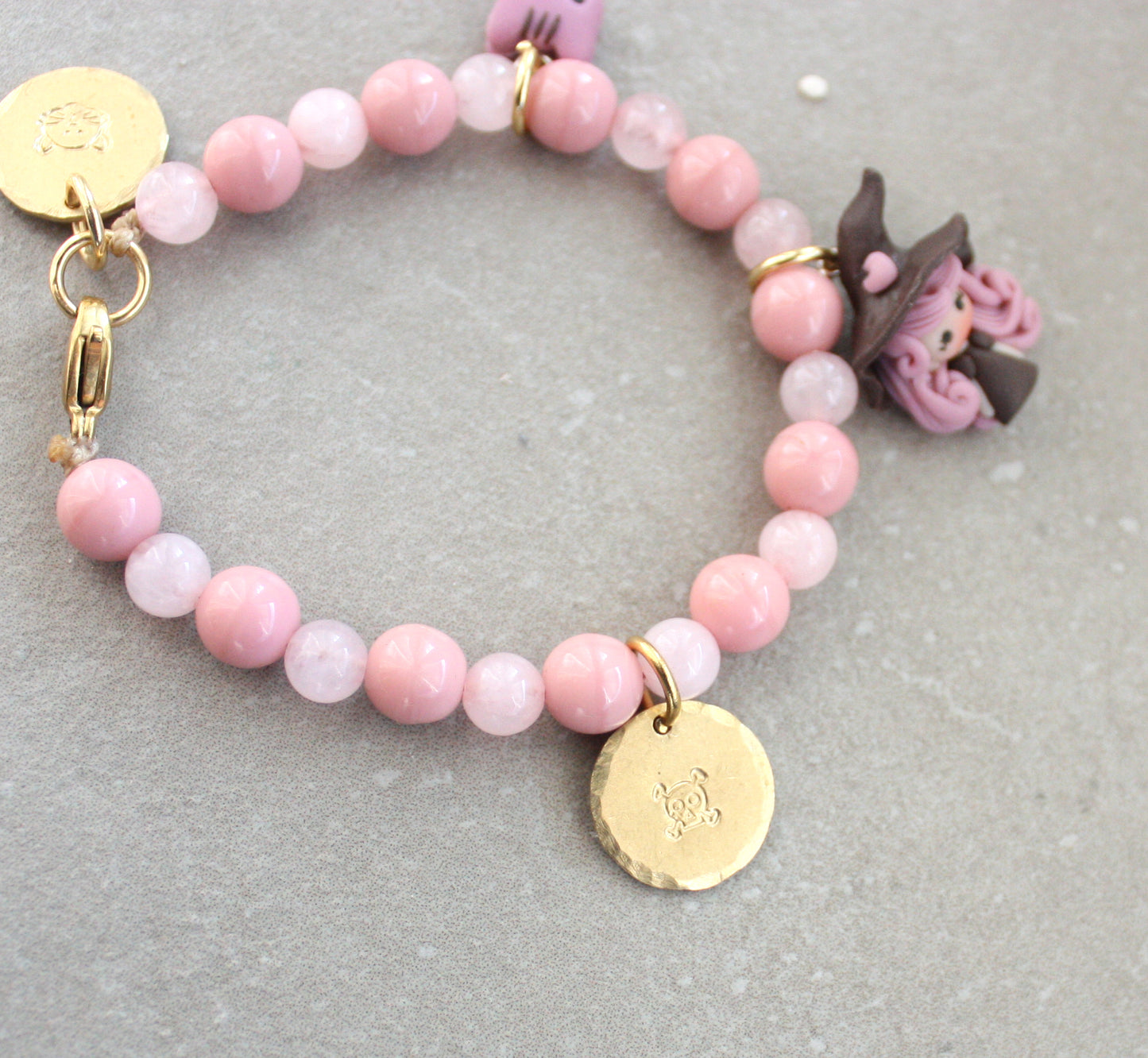 Bracciale pietre rosa e streghetta
