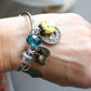 Alice in Wonderland multicharm bangle 