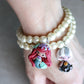 Elastic Bracelet with Beads and Polymer Clay Charm