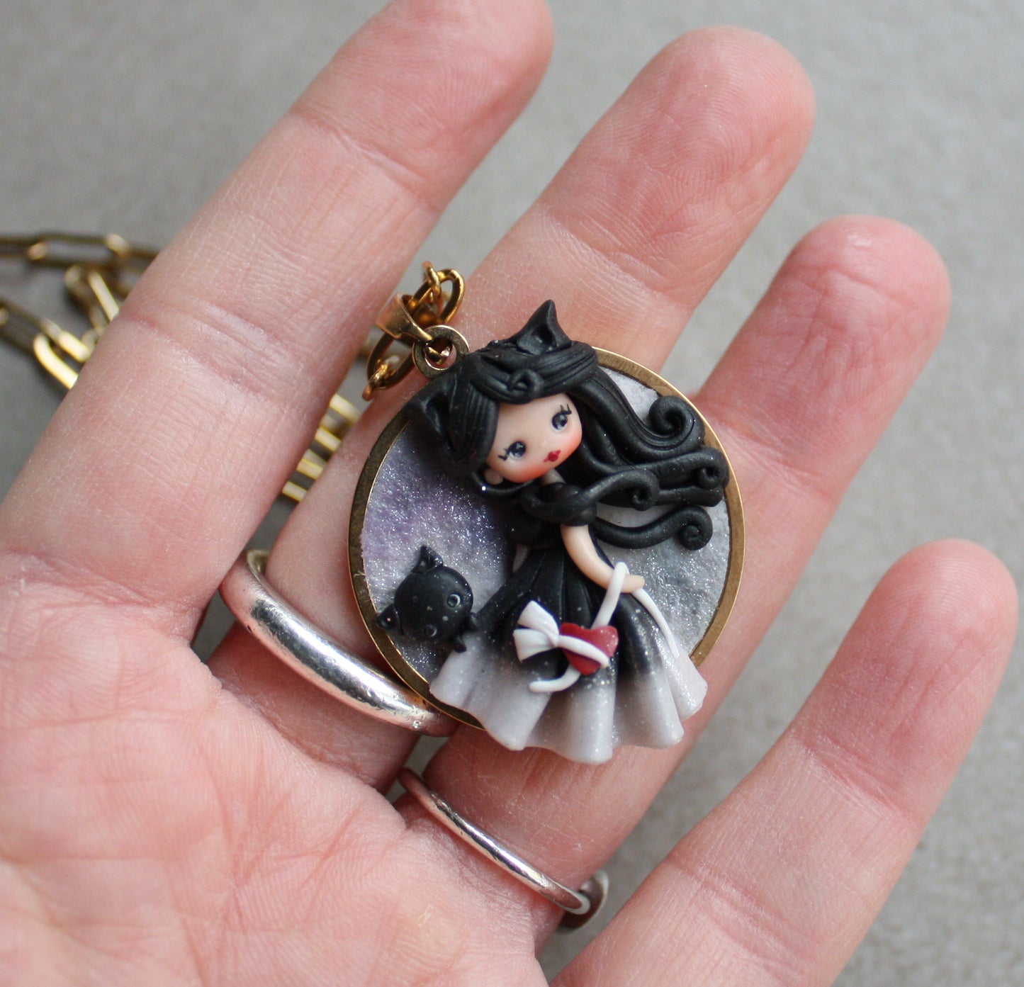 Collana in acciaio inox dorato con cammeo e cat doll