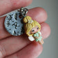 Necklace with trilly and letter
