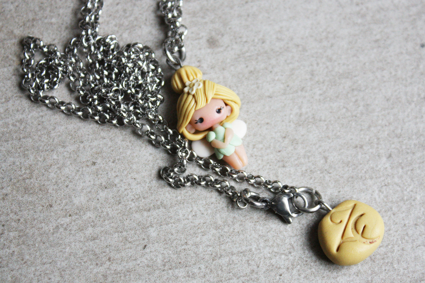 Necklace with trilly and letter