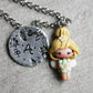 Necklace with trilly and letter