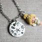 Necklace with trilly and letter