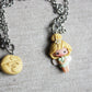 Necklace with trilly and letter