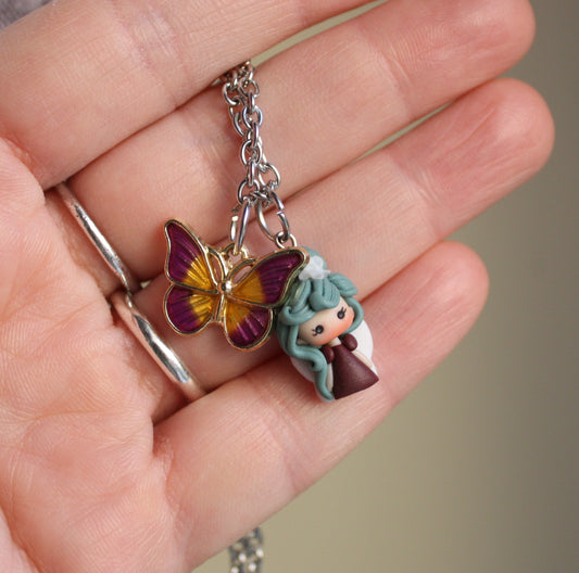 collana con fatina viola e farfalla 