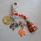 Gnome keychain – Macramé, gemstones and hand-stamped brass tag