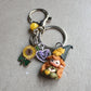 Portachiavi con gnoma in fimo e charms