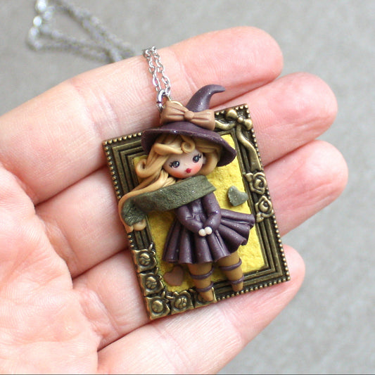 Collana in acciaio inox con piccola streghetta in fimo