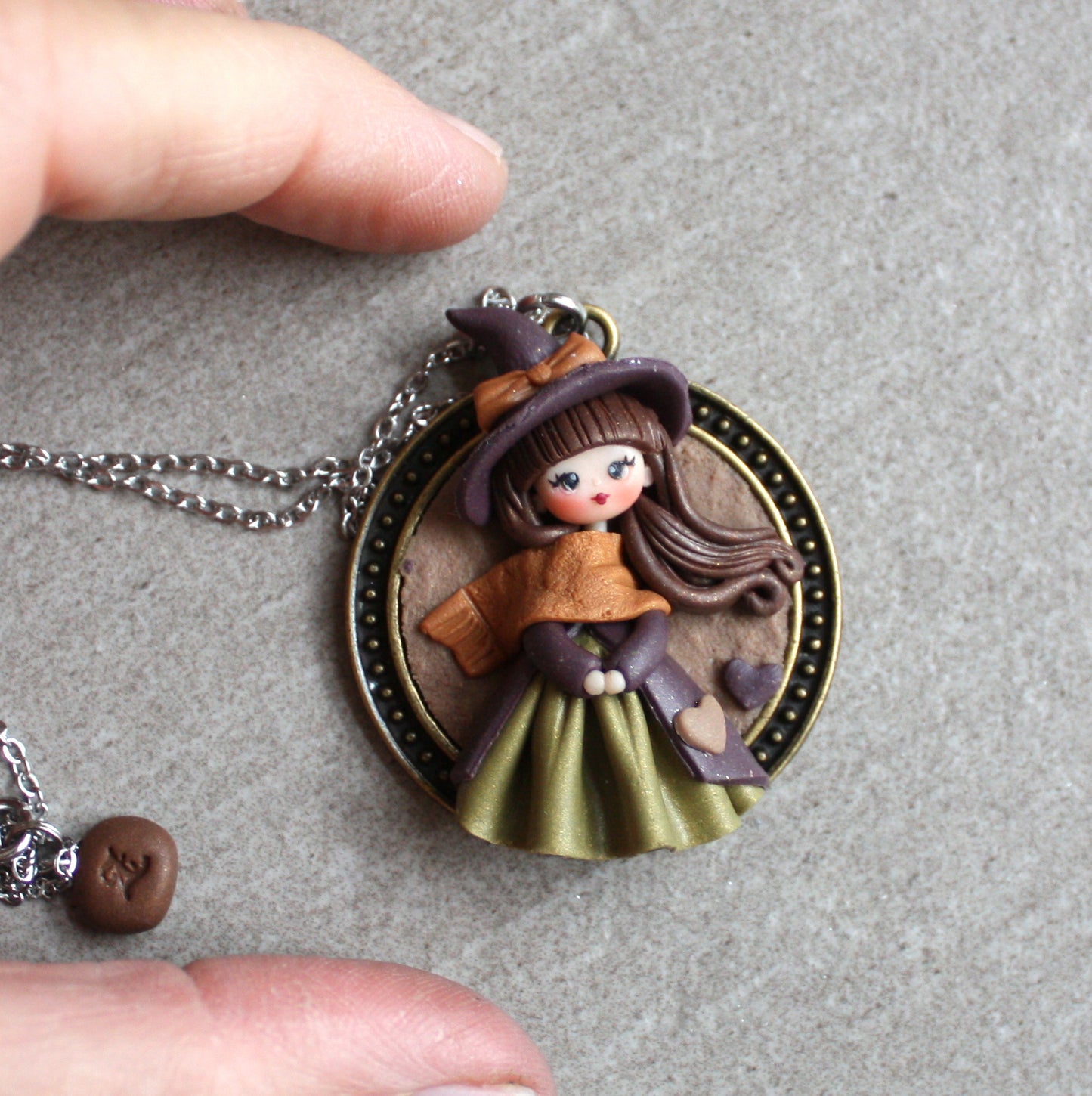 Collana in acciaio inox con piccola streghetta in fimo X