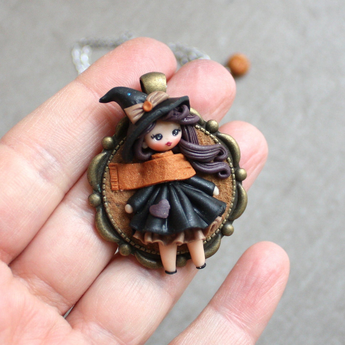 Collana in acciaio inox con piccola streghetta in fimo II